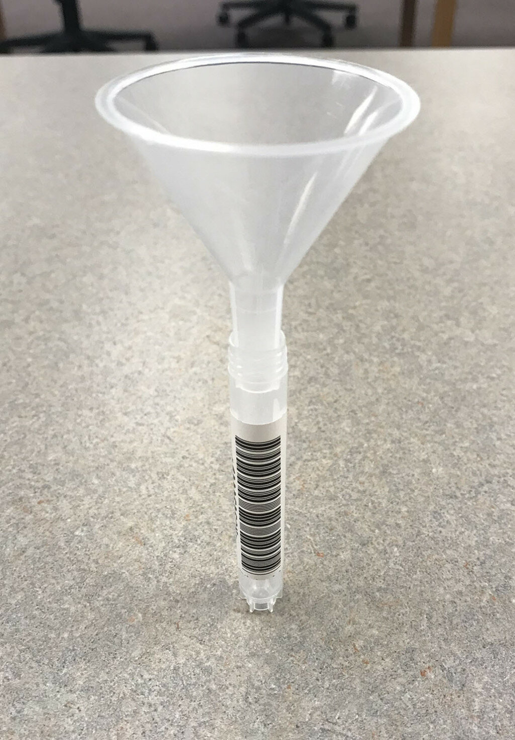 Vial used for the covidSHIELD saliva-based RT-PCR test.