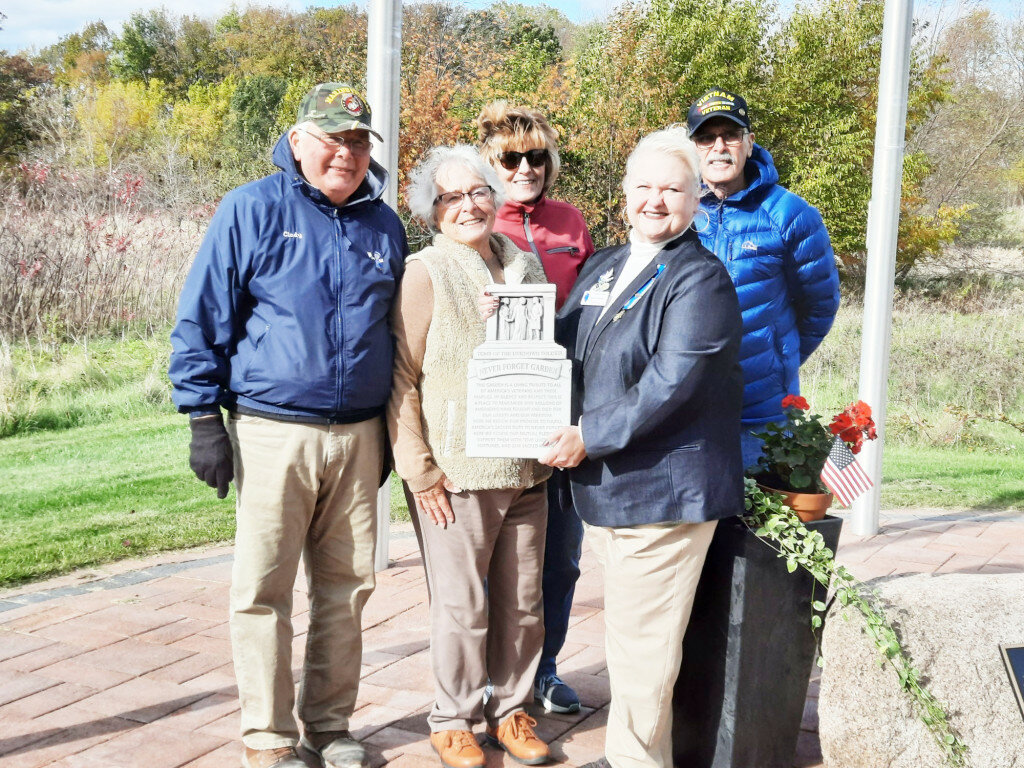 The Woodlawn Cemetery Board is shown receiving the Never Forget Garden marker from Rochelle Chapter NSDAR Vice Regent Debby Katzman. Left to right: Lyle Headon, Joan Pierce, Priscilla Thuestad, Katzman and Dan Graber.