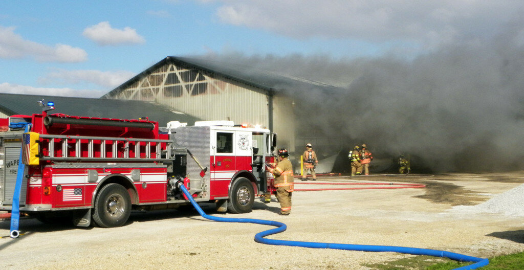 Gordon Woods / Journal — Firefighters from Wapella, Clinton, Kenney and Waynesville responded at about 2:30 p.m. Friday to a fire at the Wapella Township building, located on Walnut Circle, Wapella.  FIrefighters are still on the scene.  No other information is currently available.