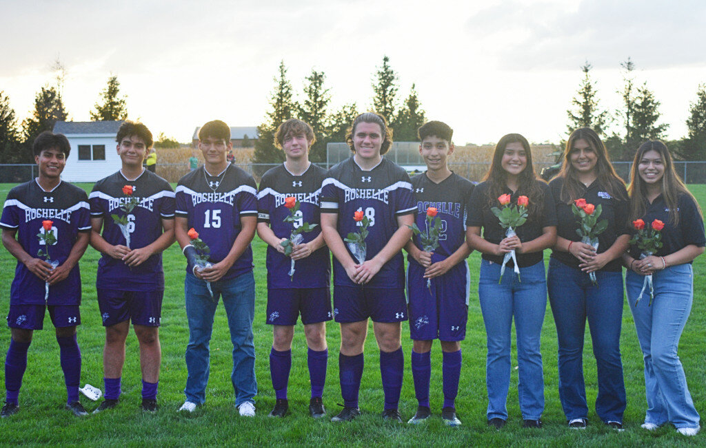 The Rochelle Hub soccer team recognized its six senior players and three senior managers after Thursday’s nonconference match against the Mendota Trojans. Above from left to right are Josue Orozco, Carlos Morales, Michael Ramsey, Caleb Ritter, Bryce Whitehead, Johnavon Hueramo, Lizbeth Milan, Ceci Vargas and Aolani Perez. (Photo by Russell Hodges)