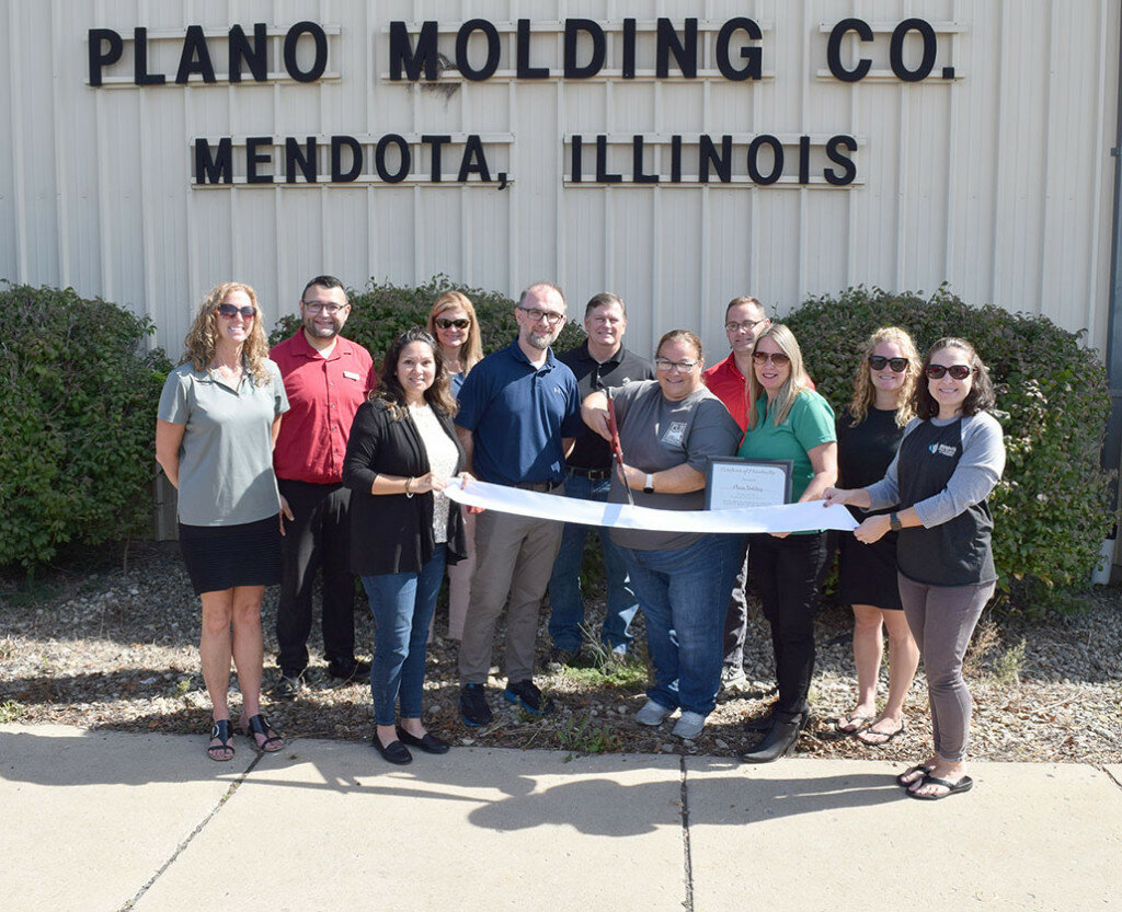Front row, left to right, are Tina McPheeters, Chamber Board; Jason Zejnilhodzic, Plano Molding operations manager; Kelly Lewis, Plano Molding plant manager; Shelby Weide, Chamber President/CEO; and Christin Atherton, Chamber Ambassador; back row, Kim Kennedy, Chamber Ambassador; Jesse Arellano, Chamber Board; Emily McConville, Mendota City Clerk; Jeff Mauck, Chamber Board; Steve Donnell, Chamber Board; and Erin Lauer, Chamber Ambassador. (Reporter photo)