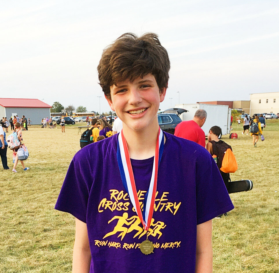 Declan McGee medaled in 15th place to lead the Rochelle Middle School cross country teams at the North Central Junior Conference Championship meet. (Photo by Russell Hodges)