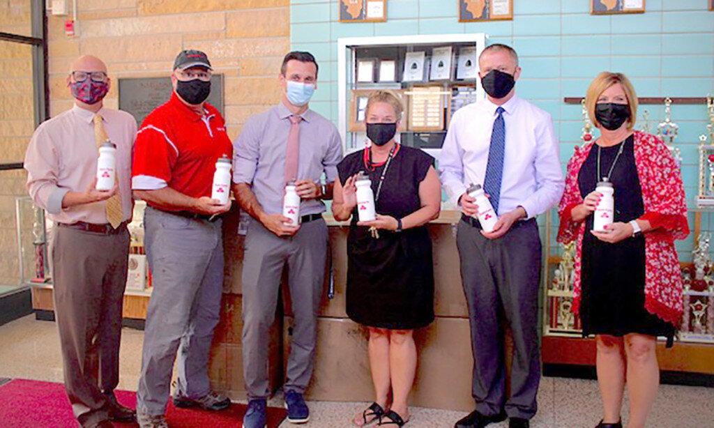 Kurt Bruno State Farm Insurance delivered reusable water bottles to the Mendota Elementary District 289 schools on Aug. 31. Left to right, are Brad Cox, superintendent; Kurt Bruno; Emory Burdette, Northbrook assistant principal; Paula Daley, Northbrook principal; Dave Lawrence, Lincoln principal; and Stacy Kelly, Blackstone principal. (Photo contributed)