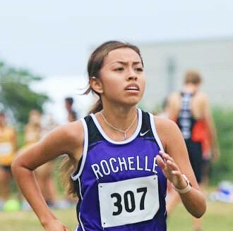Junior Yuelma Ortiz led the Lady Hubs with a personal-record time when Rochelle's Hub and Lady Hub cross country teams raced in the Sycamore Invitational at Kishwaukee College on Tuesday. (Photo by Marcy DeLille)