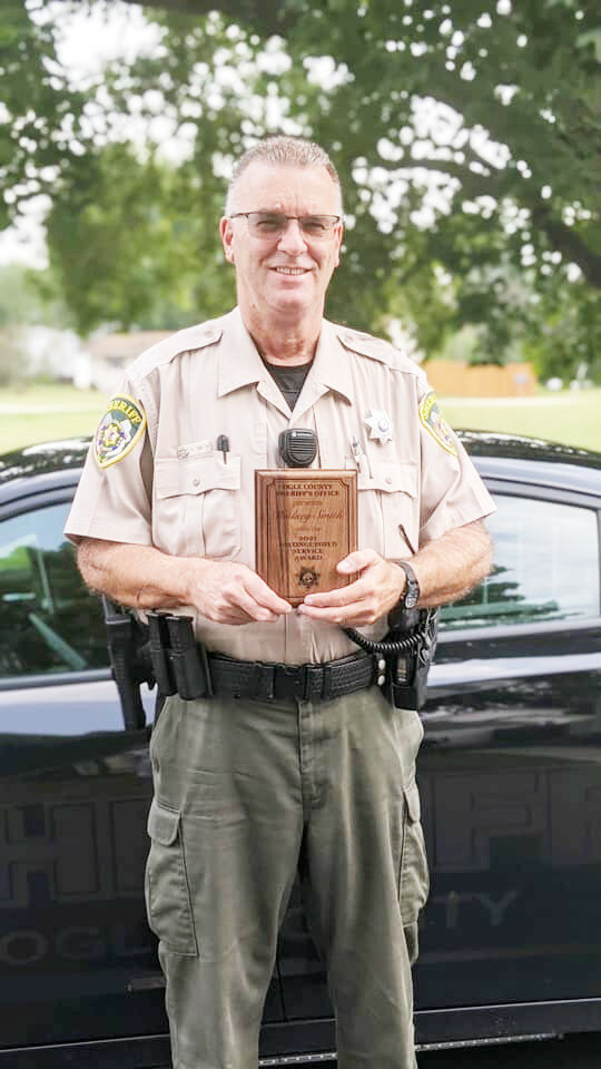 Ogle County Sheriff Brian VanVickle recently presented Deputy Rodney Smith with the Distinguished Service Award for his efforts in traffic safety, not only for the previous year, but throughout his more than 30 years at the Ogle County Sheriff’s Office.
