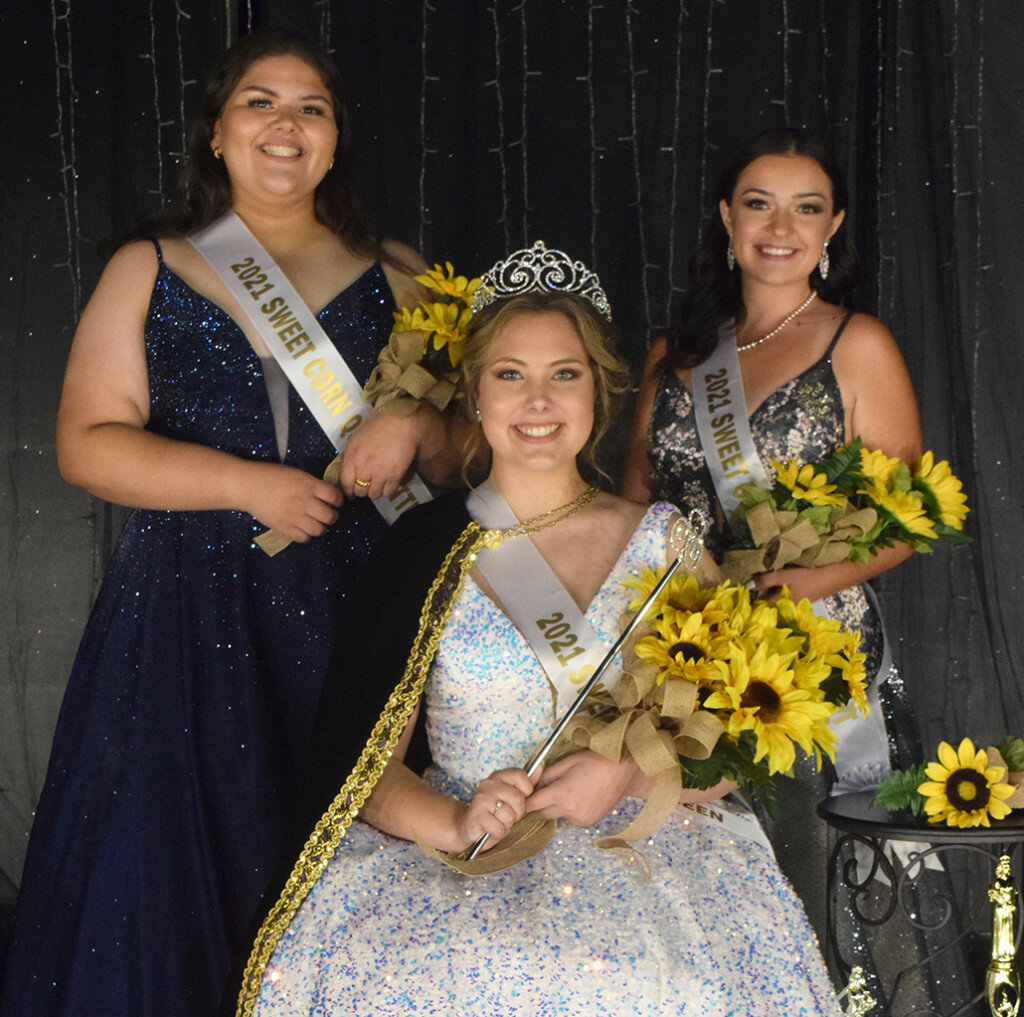 Perris Stachlewitz, seated, was chosen Queen of the Sweet Corn Festival at the Aug. 13 pageant. Natalie Orozco, left, and Olivia Eddy were named attendants. (Reporter photo)