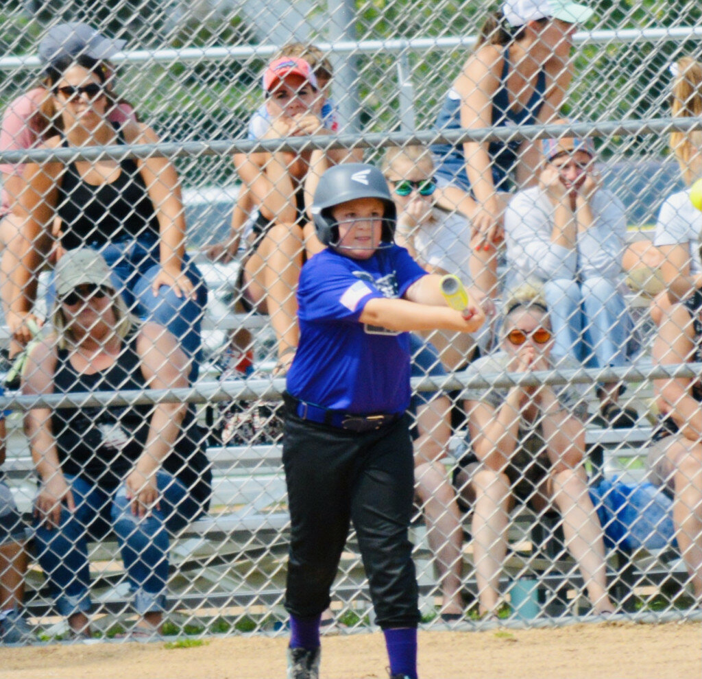 Elise Hardcastle hits a single for the Rochelle Little League 10U Softball All-Stars against Freeport on Saturday. (Photo by Robin Rethwill)