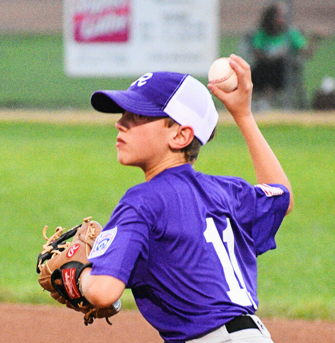 Connor Lewis makes a throw from second base during the Rochelle Little League 12U Baseball All-Star team's victory over Rock Falls on Wednesday. (Photo by Russell Hodges)