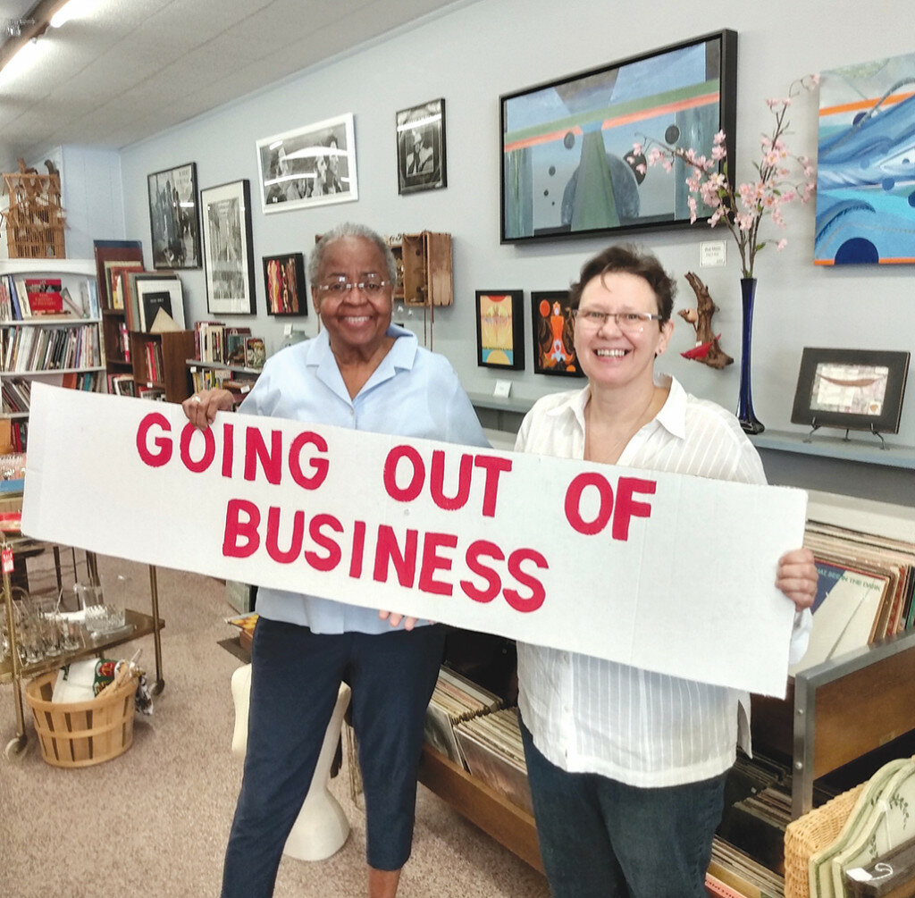 Shirley Guay and Rosalie Koldan hold up a going out of business sign inside their downtown Amboy business Amboy Arts and Antiques. The business partners decided to close the doors to the store so they can focus on creating art fulltime.
Photo submitted