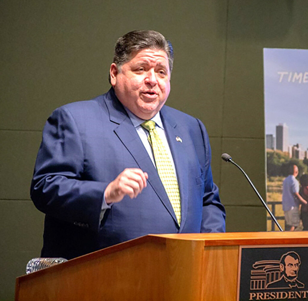 Gov. JB Pritzker speaks at an event in Springfield in May to encourage road trips to Illinois. (Capitol News Illinois file photo by Jerry Nowicki)