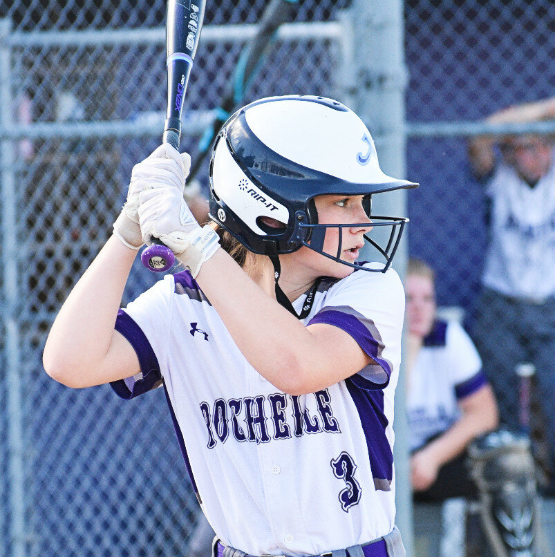 Freshman Ella Alfano looks for a pitch to drive during the Rochelle Lady Hub varsity softball game against Ottawa on Wednesday. (Photo by Russell Hodges)