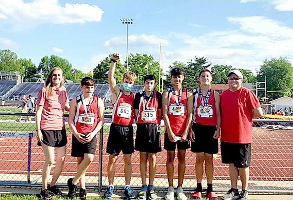 Northbrook School competed in the Illinois Junior High Elite State Track and Field Invitational, which was held in lieu of the IESA State Track Meet, and the Spartans produced one state champion and two other top five finishes. Left to right, are coach Heather Friedlein, Aaden Castle, Anthony Kelson, Johan Cortez, Sebastian Carlos, Aiden Redcliff and coach Troy Bauer. (Photo contributed)