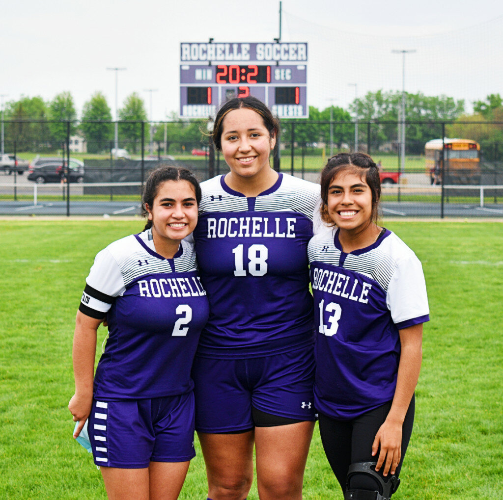 The Rochelle Lady Hub varsity soccer team honored its three seniors after taking the field against Stillman Valley on Friday. Above from left to right are Ayah Sbeih, Nadia Castillo and Vianey Perusquia. (Photo by Russell Hodges)