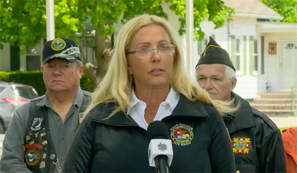 Sen. Sue Rezin, R-Morris, stands with local veterans in front of the LaSalle Veterans' Home to discuss legislation that seeks to address the failures documented at the LaSalle home during a deadly COVID-19 outbreak in November. (Credit: Blueroomstream.com)