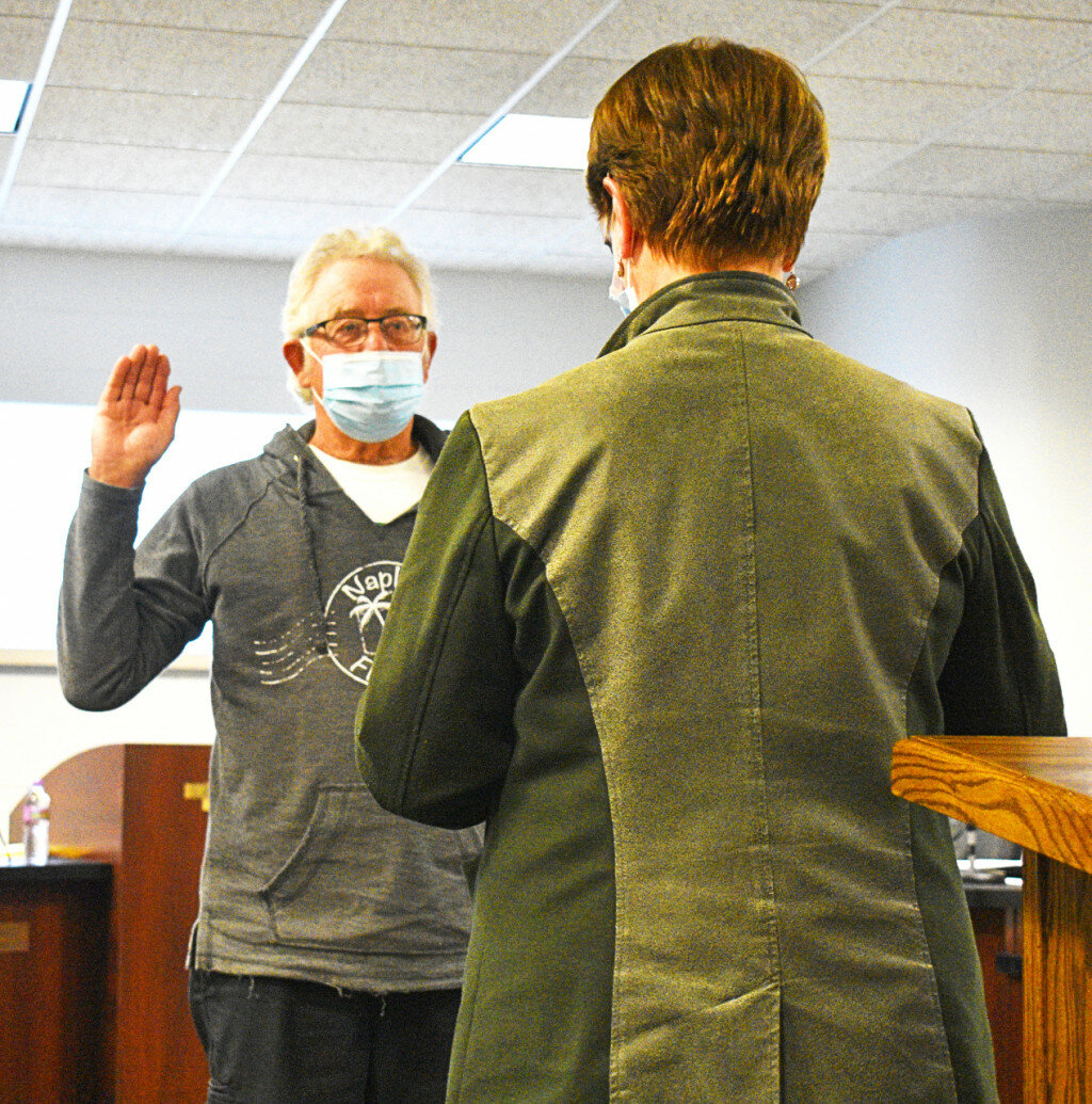 Hillcrest Trustee Randy Salsbury takes his oath of office during the monthly village board meeting Wednesday. (Photo by Russell Hodges)
