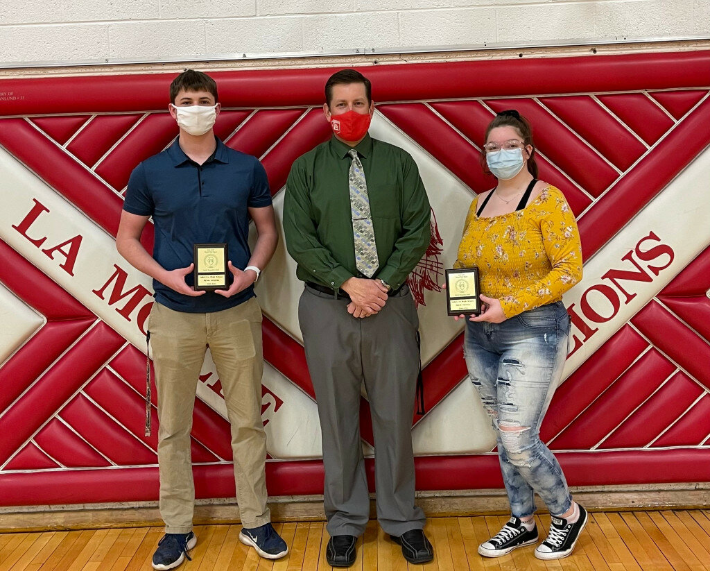 LaMoille High School seniors, Dylan Lovgren, left, and Chloe Carroll, right, are congratulated by District Superintendent/LHS principal, Brent J. Ziegler. (Photo contributed)