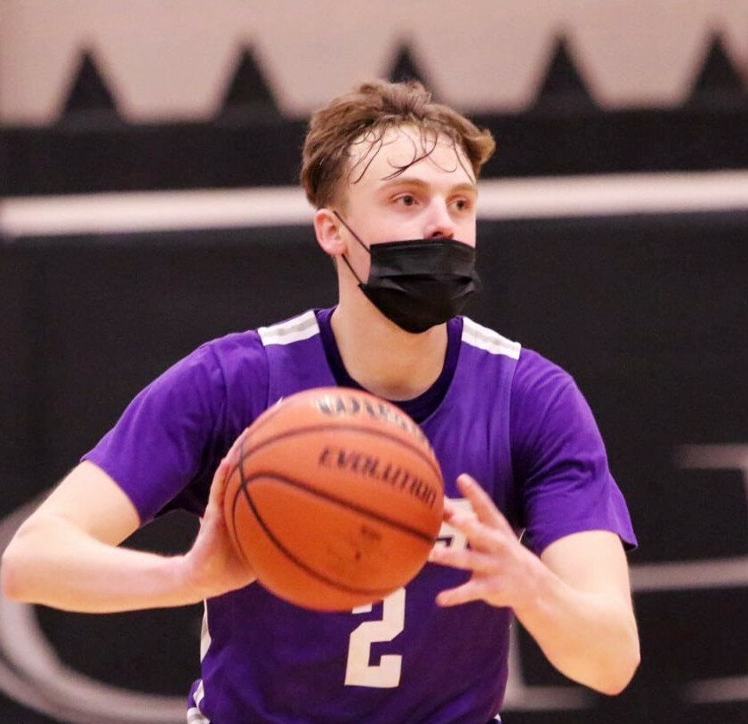 Senior Garrett Burdin hit a buzzer-beating 3-point shot to seal Rochelle's road win over Morris on Wednesday. (File photo by Marcy DeLille)