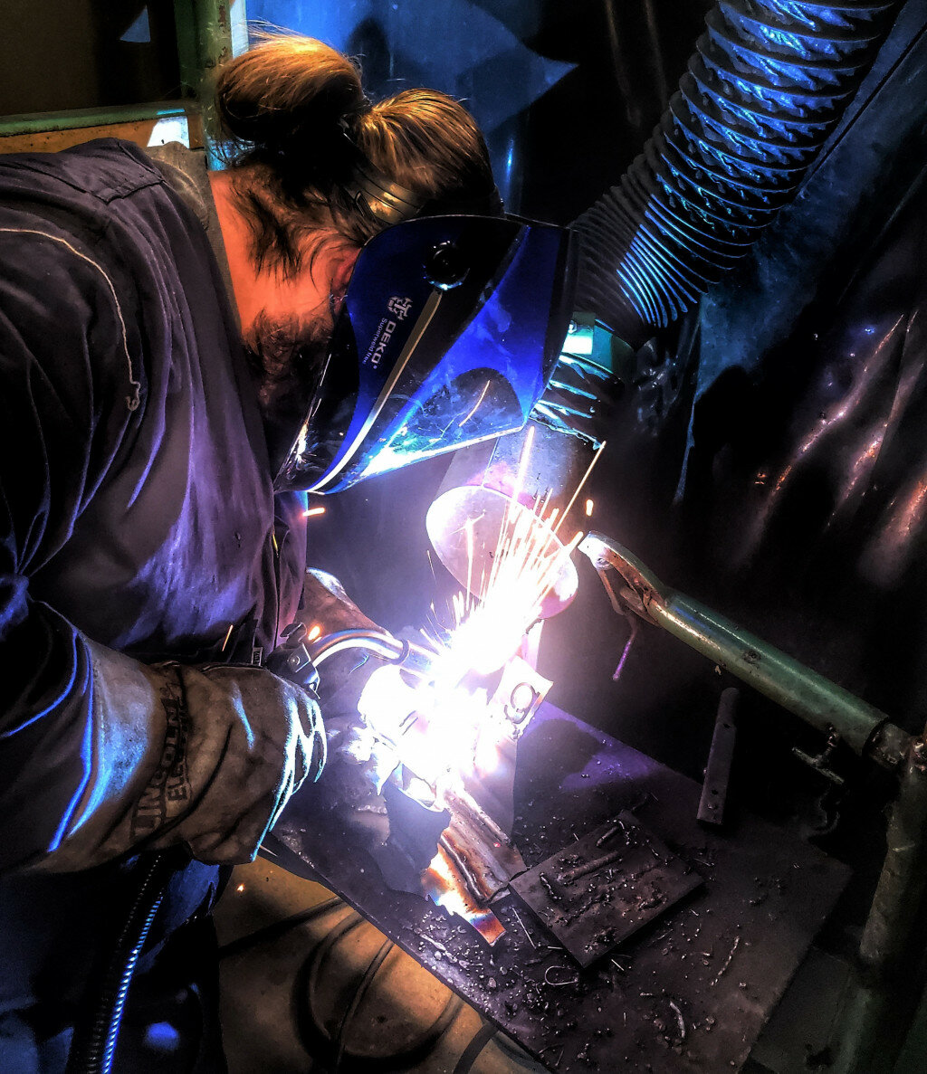 Bryce Brazee (above) is a Rochelle Township High School senior. Every afternoon he is a welding 
student in  Keith Nelson’s class at KEC.  Nelson shot this photo as Bryce perfected a T-joint weld.