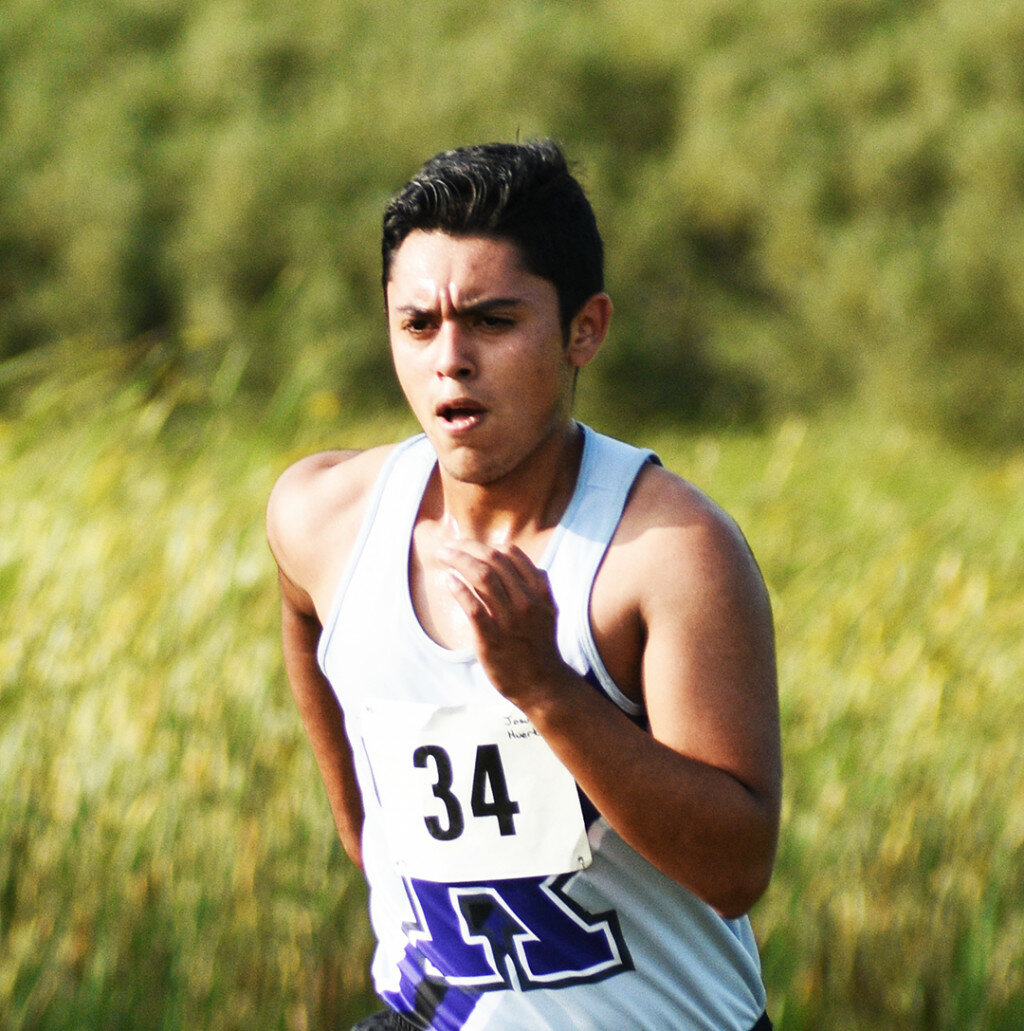 Junior Josue Huerta races to the finish. Huerta was one of Rochelle's top runners during the Interstate 8 Conference Championships on Saturday. (File photo by Russell Hodges)