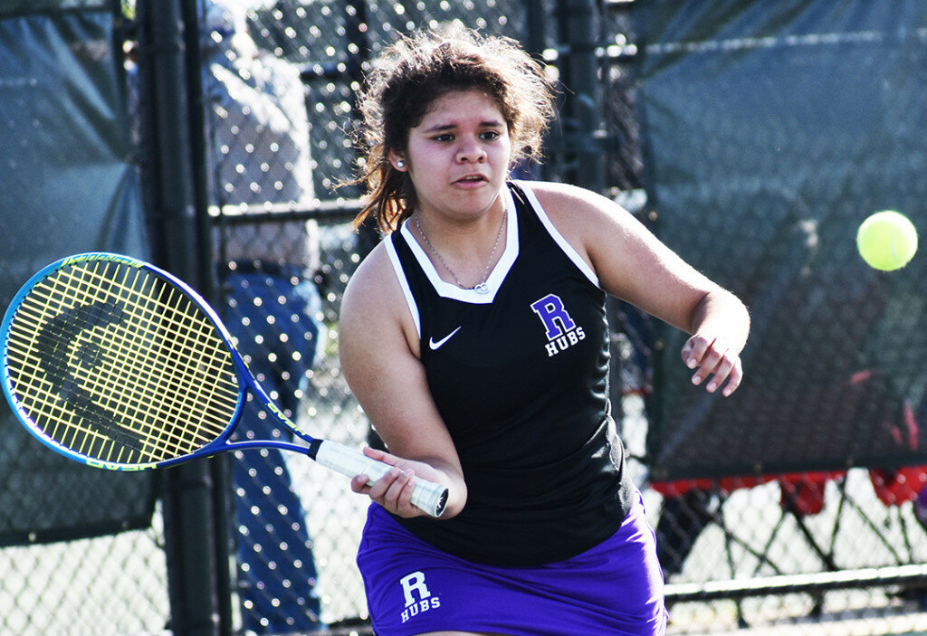 Rochelle senior Anna Guevara said she enjoys the challenge of singles play. Guevara has earned her way up to the Lady Hub tennis team's No. 1 singles position this fall. (Photo by Russell Hodges)