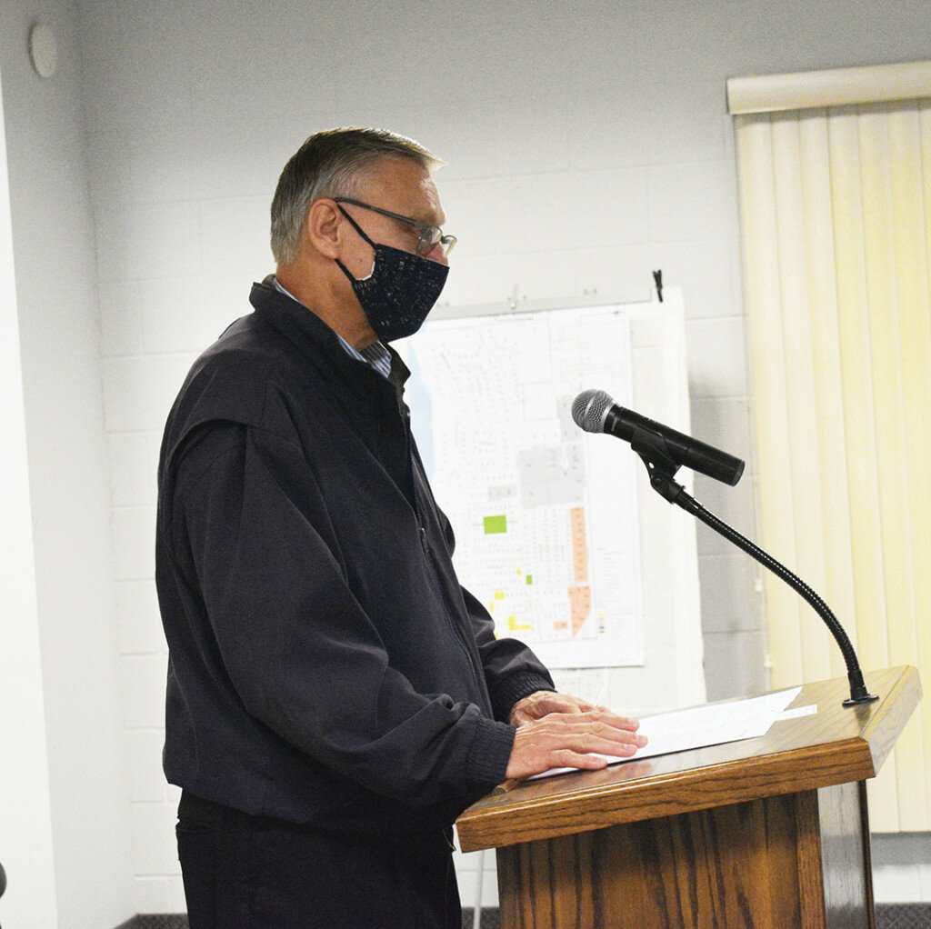 Baxter & Woodman's Carl Fischer addresses the Hillcrest Board of Trustees during its monthly meeting on Wednesday. (Photo by Russell Hodges)