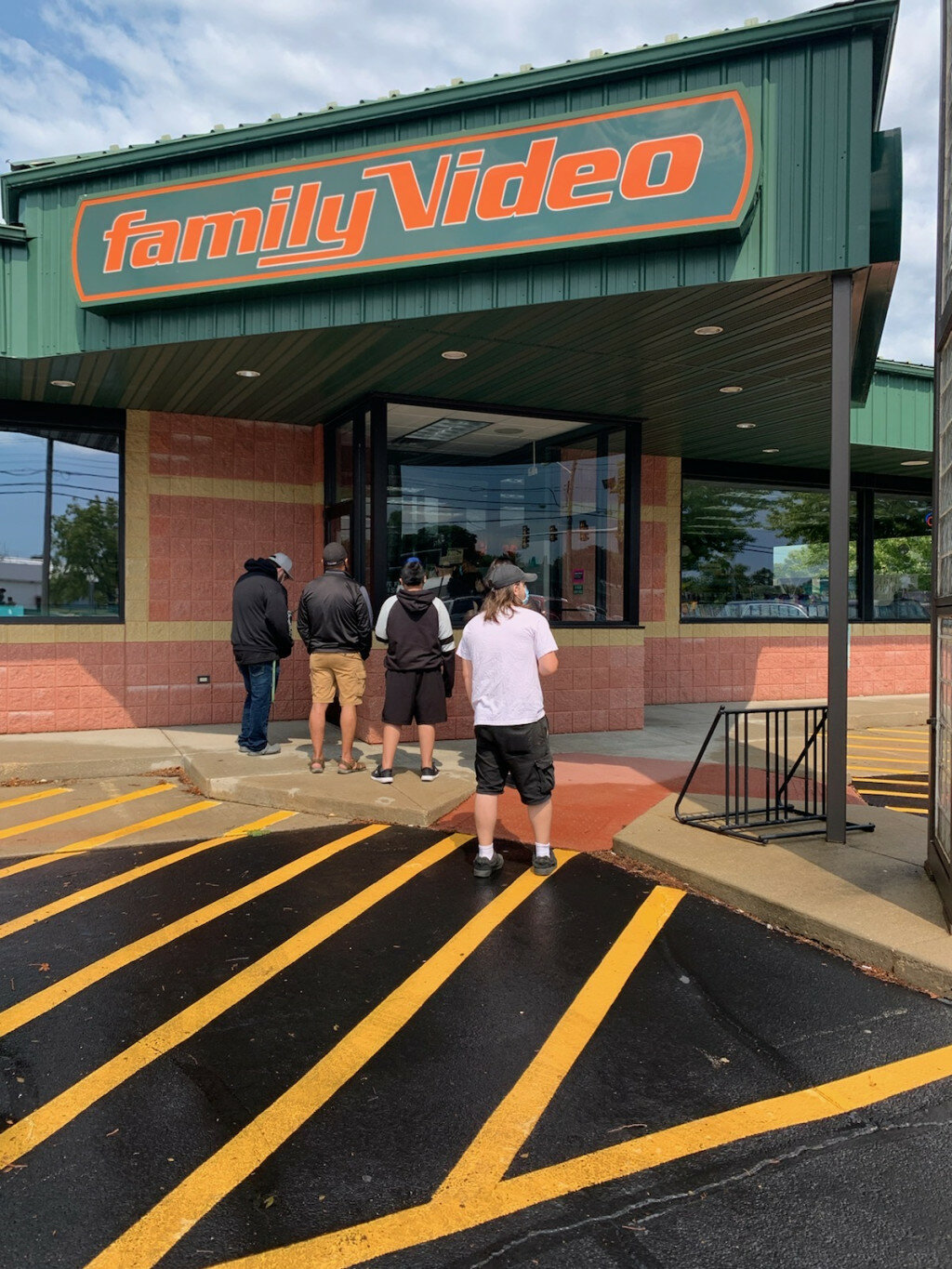 Locals wait to enter the Family Video store off Route 38 in Rochelle on Sunday. An employee with the store confirmed the video chain will be closing its Rochelle location some time in the near future.