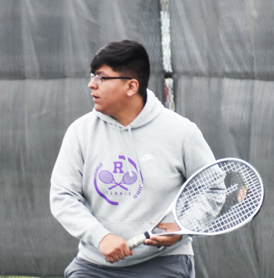 Rochelle senior Gabe Nava spent four years with the Hub tennis program. While he initially joined to see his friends after school, Nava went on to become a top doubles player for the varsity team. (File photo by Russell Hodges)