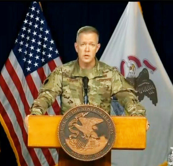 Brig. Gen. Richard Neely, adjutant general of the Illinois National Guard, speaks at a news conference in Chicago Monday. He said the Guard was used to “provide a cordon” around the city of Chicago Sunday, setting a perimeter and “supporting those peaceful protesters and ensuring control of the downtown area.”