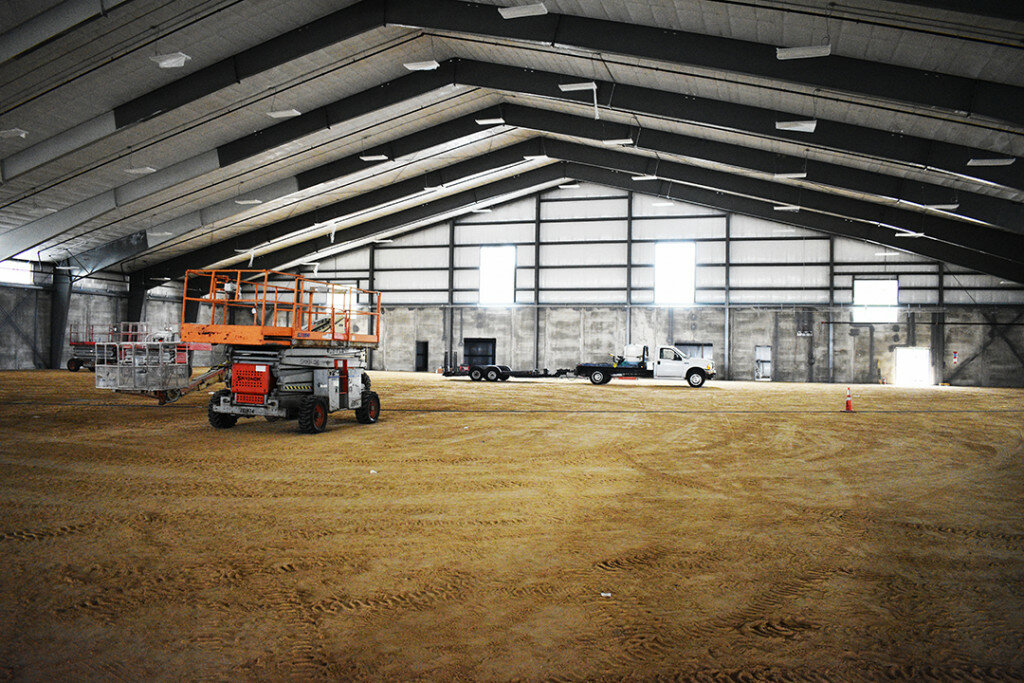 Several areas inside the $14 million recreation center are beginning to take shape, including the turf area which will be supported by a crushed stone base. (Photo by Russell Hodges)