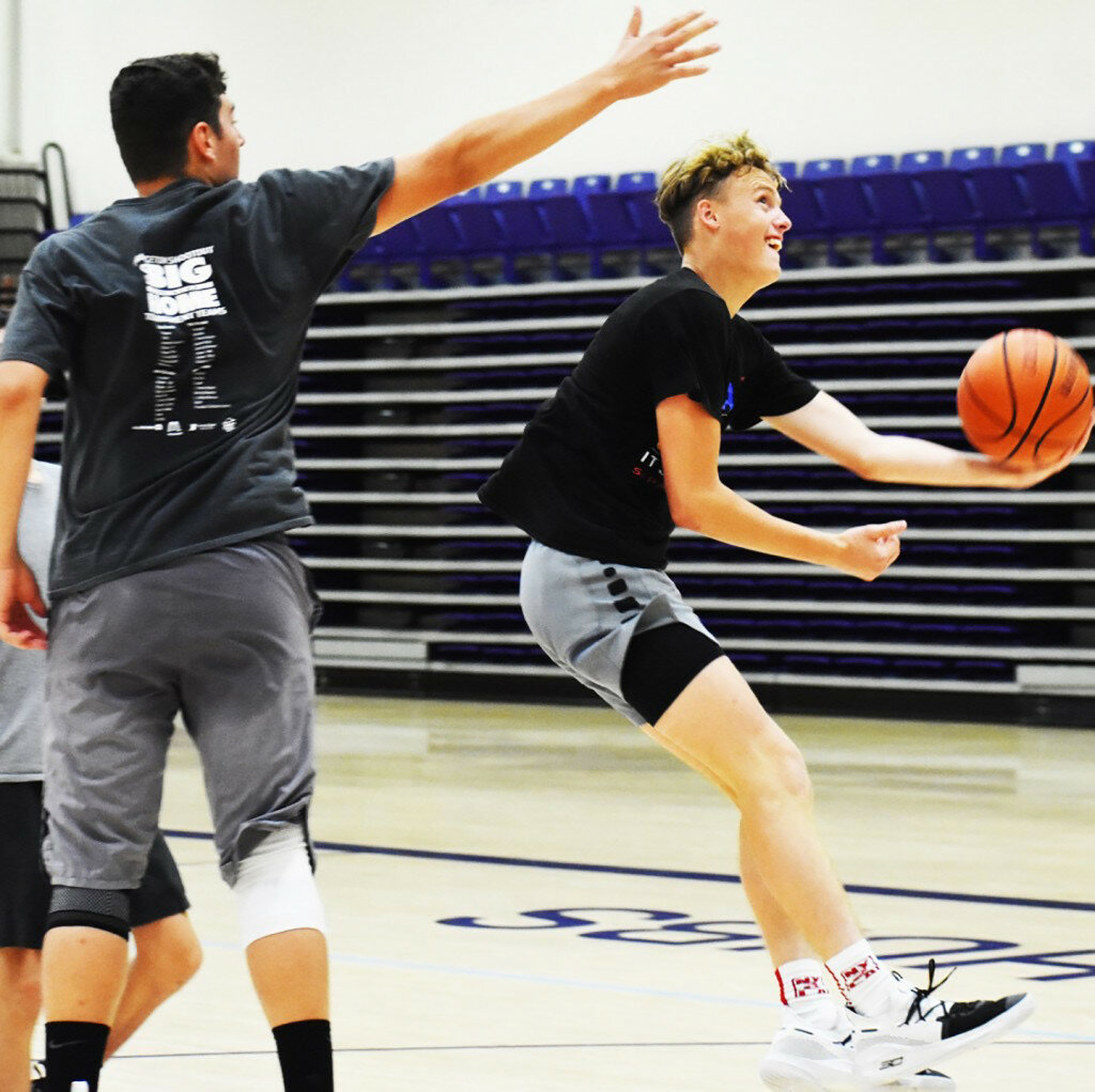 The Rochelle boys basketball team is one of several athletic programs at the high school that are changing course with summer activities due to COVID-19 restrictions. (File photo by Russell Hodges)