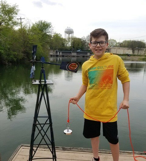 Mason Moore found a windmill belonging to Joanne Rogde in Spring Lake while magnet fishing with his dad this week.