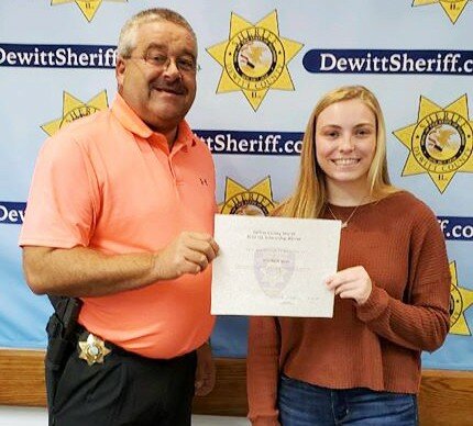 Courtesy of the DeWitt County Sheriff’s Office — The 2020 DeWitt County Sheriff’s Office Scholarship Recipient is Elizabeth Maier.  Sheriff Mike Walker presents Maier with the scholarship at the sheriff’s office.