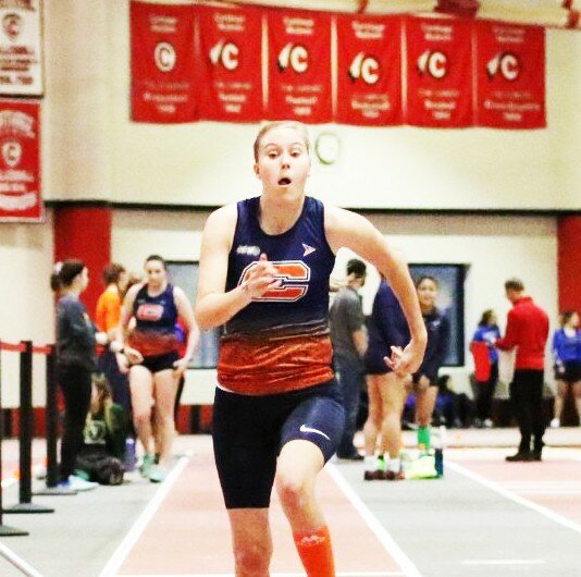 Former Rochelle student-athlete and U.S. Paralympian Aubrey Headon competed in both sprints and the long jump for the Carroll University women's track and field team this winter. (Photo by Marcy DeLille)