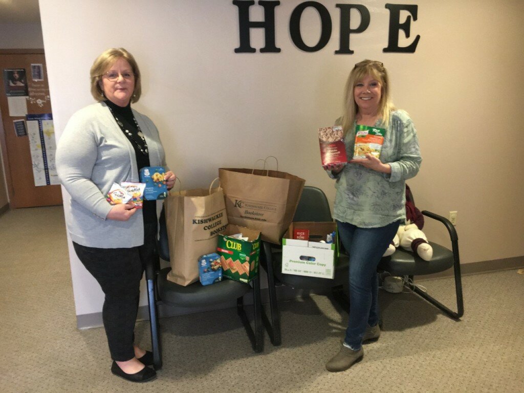 Kishwaukee College makes multiple donations to local organizations to assist those in need and those on the frontlines during COVID-19. Pictured left to right, Kelly Kempson and Diana Johnson accept a food donation in behalf of HOPE of Ogle Country from Kishwaukee College.