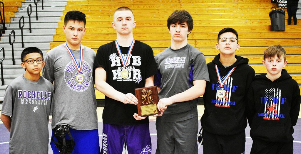 The Rochelle Wrestling Club qualified six individuals for the IKWF State Championships later this week. Above from left to right, pictured with the third-place Senior Division trophy, are Xavier Villalobos, Lauro Cabral, Kaiden Morris, Erich Metzger, Roman Villalobos and Thomas Tourdot. (Photo by Russell Hodges)
