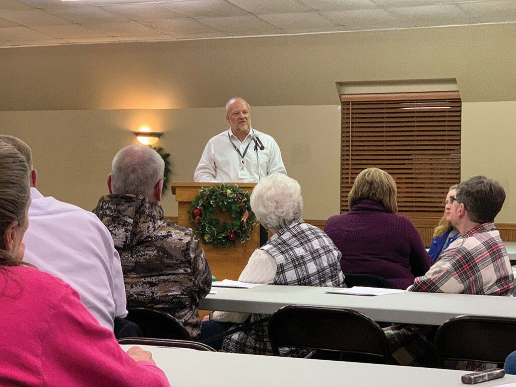 Above, Sinnissippi Centers President/CEO Patrick Phalen addresses the crowd and Amboy City Council during the Amboy City Council meeting on Monday night.