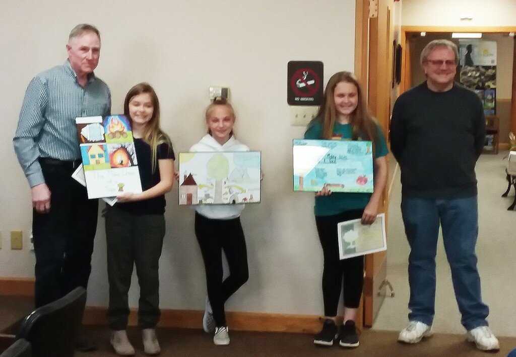 Gordon Woods / Journal
Mayor Roger Cyrulik and Tree Commission chairman John Baker with the three student artist winners of the 2019 Arbor Day poster contest. First place was Miley Koyak, second place Kierra Durbin and third place Mabrey Schick.  The annual Arbor Day ceremony is scheduled for 10 a.m. on Saturday, April 27 in the 1100 block of E. Washington Street.
