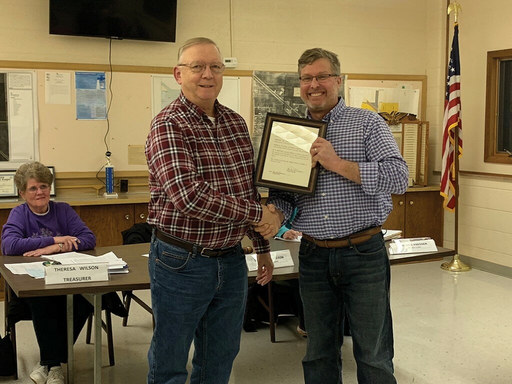 Sublette Village President Michael Vaessen presented Steve Klein, of Sublette Farmer’s Elevator, with a proclamation recognizing the business for its 100th anniversary on Monday night.
Tonja Greenfield/Amboy News