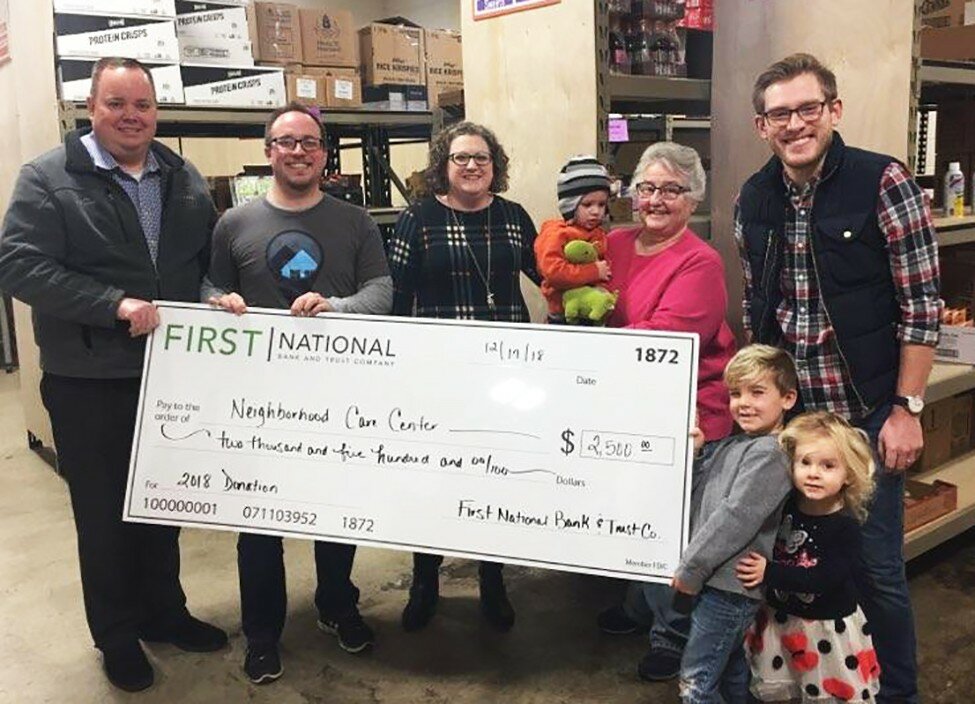 Courtesy of First National Bank & Trust / TS Banking
Pictured, Josh Shofner, First National Bank and Trust; Cody Monkman, Neighborhood Care Center; Rachel Costello, First National Bank and Trust; Karen Rice, Neighborhood Care Center; Gage Lyons, Neighborhood Care Center; and helpers.