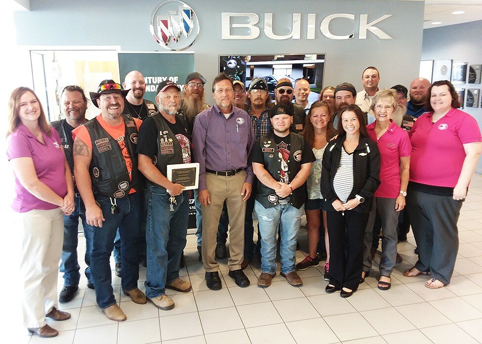 Members of Guardians of the Children advocacy group presented Scott Baum, of Baum Chevrolet-Buick, with a plaque of appreciation for supporting the group’s efforts during Baum’s annual car show, held on Sunday.  Baum’s raised nearly $11,000 for Guardians’ work advocating for victims of child abuse.

Gordon Woods / Journal