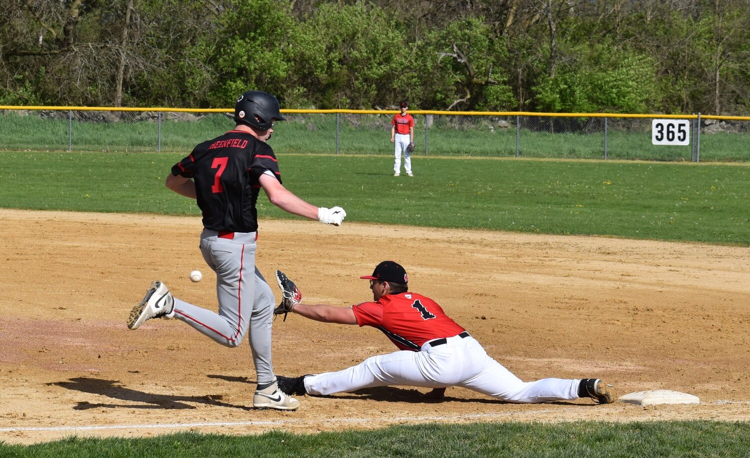 Amboy junior Dillon Merriman stretches for a grab at first base during a Northwest Upstate Illini Conference game against Forreston on Monday, April 29. The Clippers fell 12-3 after holding a 3-0 lead in the second inning.