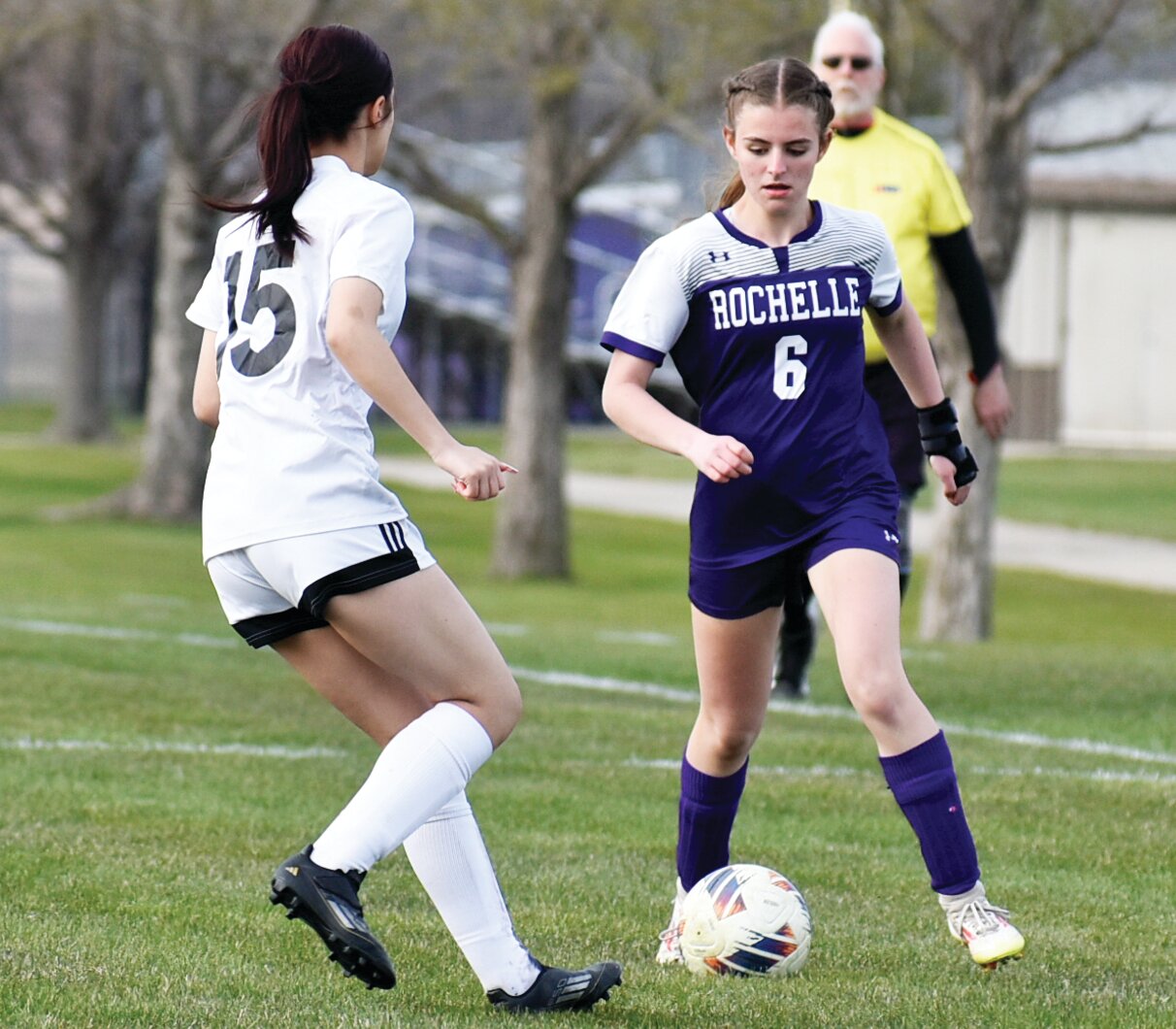 Freshman Paige Harris looks to make a move around a LaSalle-Peru midfielder during the Rochelle Lady Hub soccer game on Wednesday.