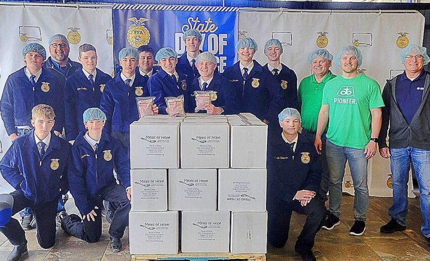 FFA members from across South Dakota work together to measure, package and seal meals during the Day of Service, Meals of Hope Project at the State FFA Convention in Brookings.