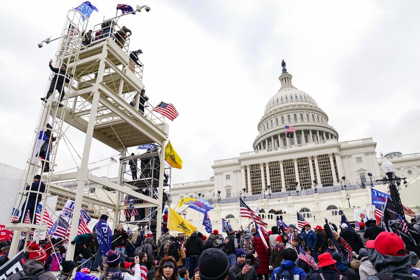 Violent insurrectionists breach the U.S. Capitol in Washington, D.C., on Jan. 6, 2021.