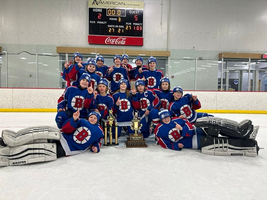 The Brookings Rangers PeeWee A team poses with the trophy after winning the state tournament in Sioux Center over the weekend. The Rangers defeated Oahe, Aberdeen and Rushmore en route to their championship.