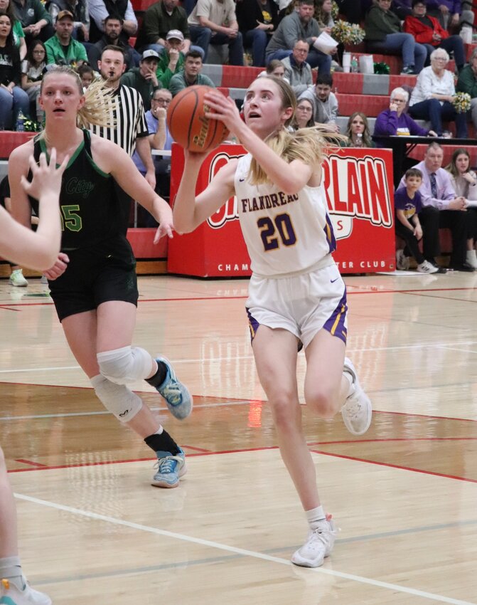 Flandreau's Morgan Sheppard drives to the rim during a Class A SoDak 16 game against Hill City on Thursday night in Chamberlain. Sheppard scored 10 points in a 58-30 win over the Bears.