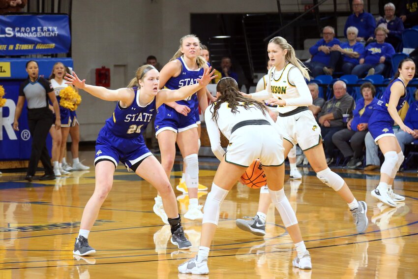 South Dakota State's Tori Nelson (20) guards North Dakota State's Elle Evans during an 89-74 win on Saturday at Frost Arena in Brookings.