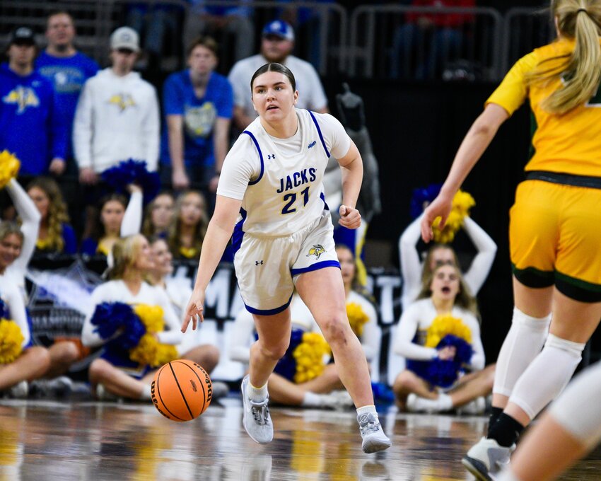 Paige Meyer #21 of the South Dakota State Jackrabbits dribbles the ball down the court during game against the North Dakota State Bison at the 2024 Summit League Basketball Championship game at the Denny Sanford Premier Center in Sioux Falls on March 12.