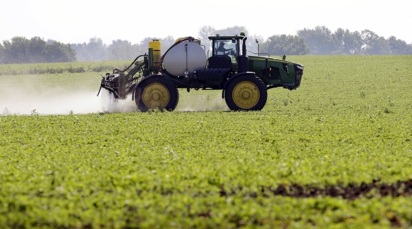 A soybean field is sprayed in Iowa, July 11, 2013.