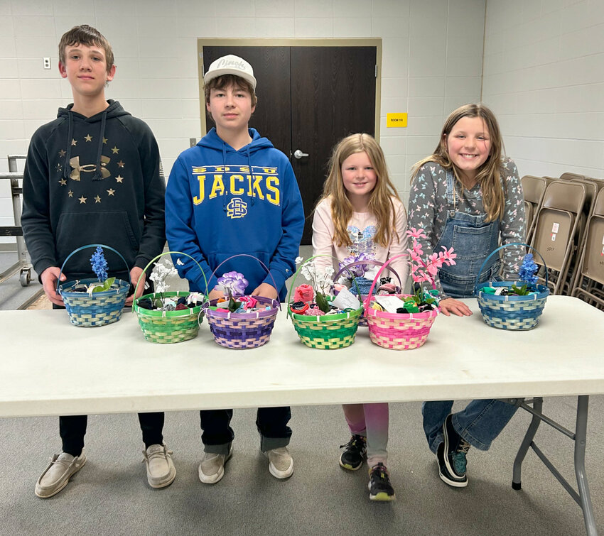 Members of the Prairie Wranglers 4-H club completed their club April community service project by completing six baskets full of fun-themed socks, which were distrubuted at Stoney Brook Living Center, Country View Estates and Avantara Assisted Living.